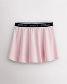 Ballet Pink Stelle tennis skirt with black logo elastic waistband, high-waisted fit, flared skirt, and built-in shorts.