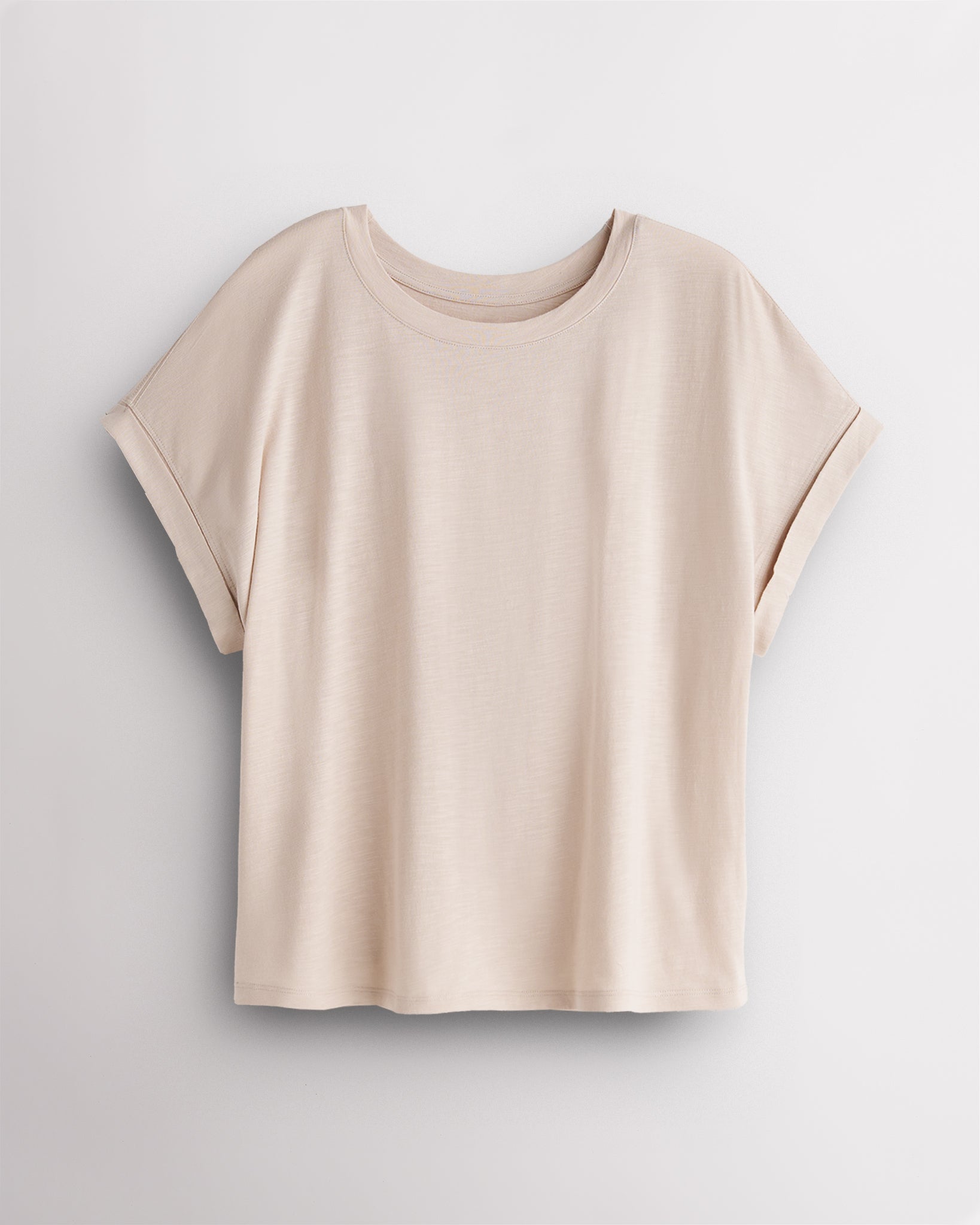 Women’s oversized short sleeve t-shirt in oat milk with relaxed fit and rolled cuffs