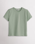 Grey Sage Stelle womens short sleeve basic t shirt with crewneck, relaxed boxy fit, and side slits on white background