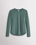 Women’s sage green UPF 50+ long sleeve sun protection shirt with curved hem and lightweight breathable fabric.