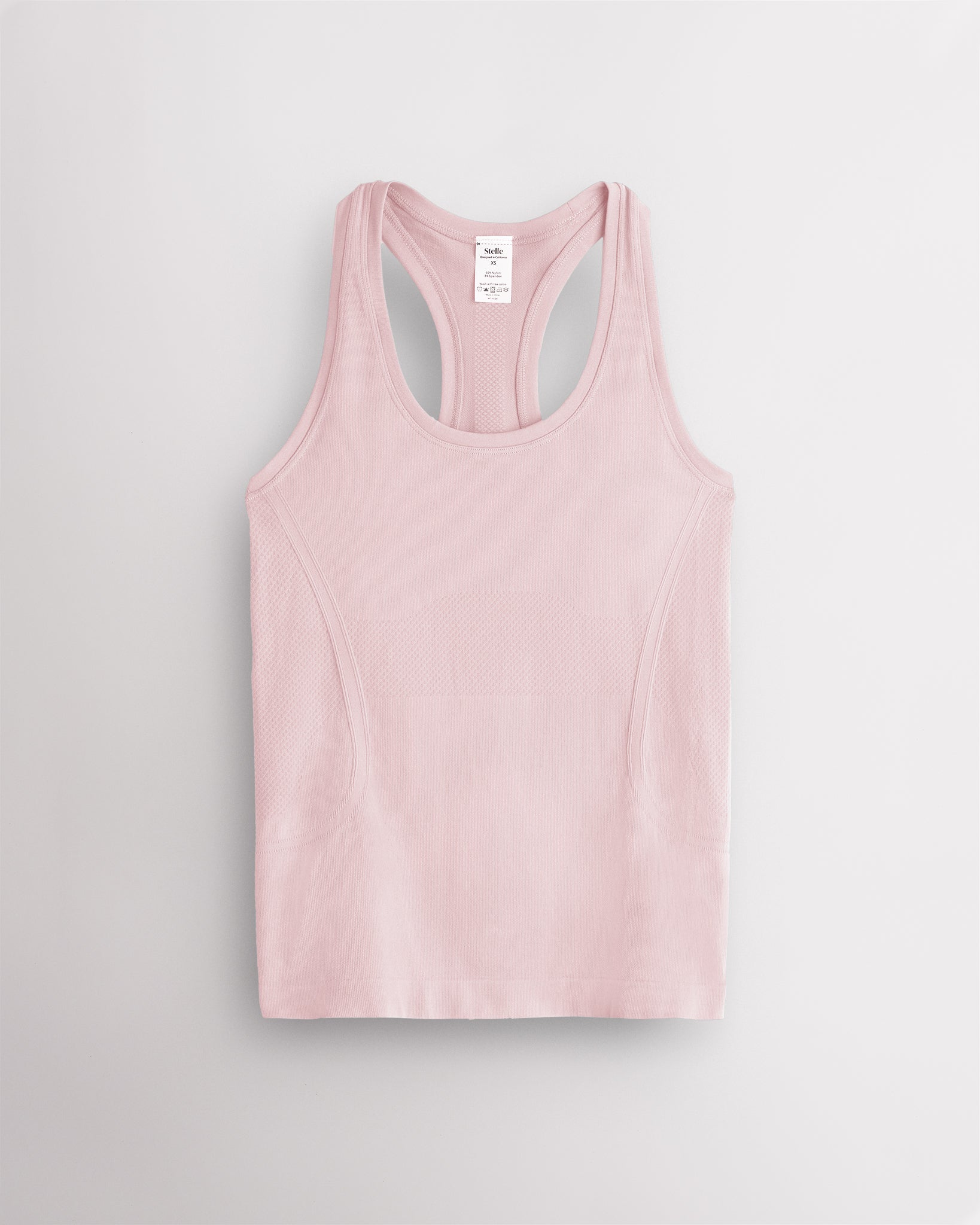 Ballet pink Stelle women's seamless racerback tank top with a round neckline.