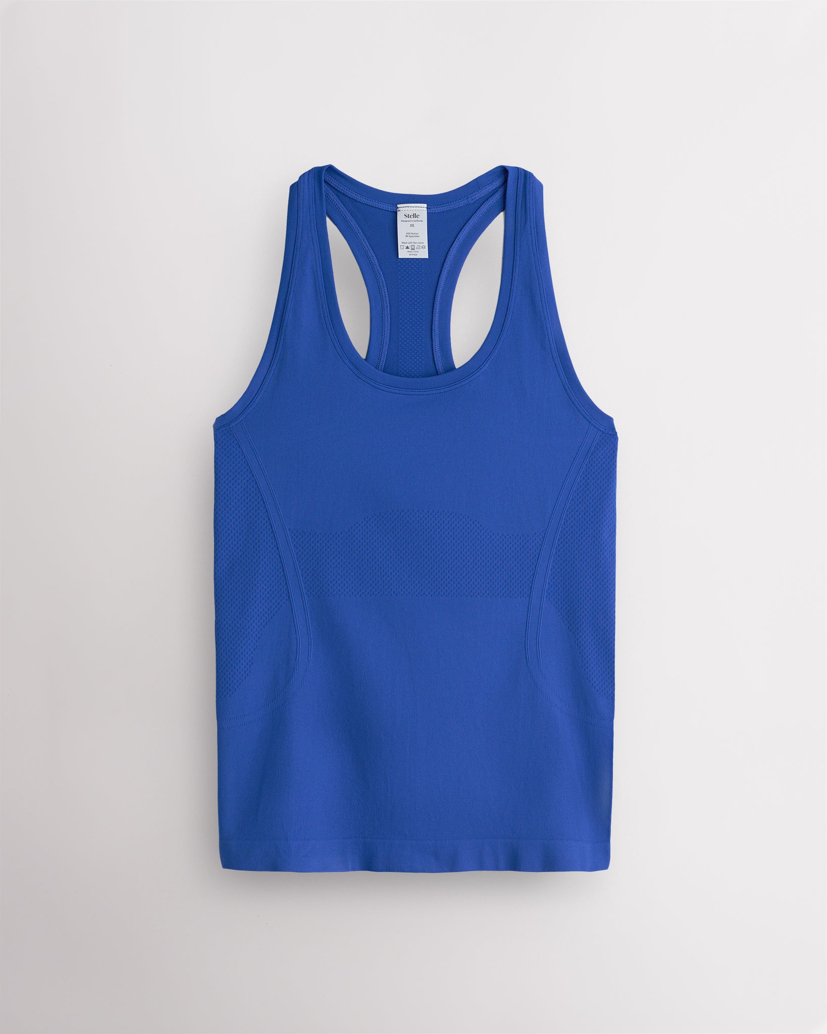 Blue Wave Stelle women's seamless racerback tank top in cool-toned blue.