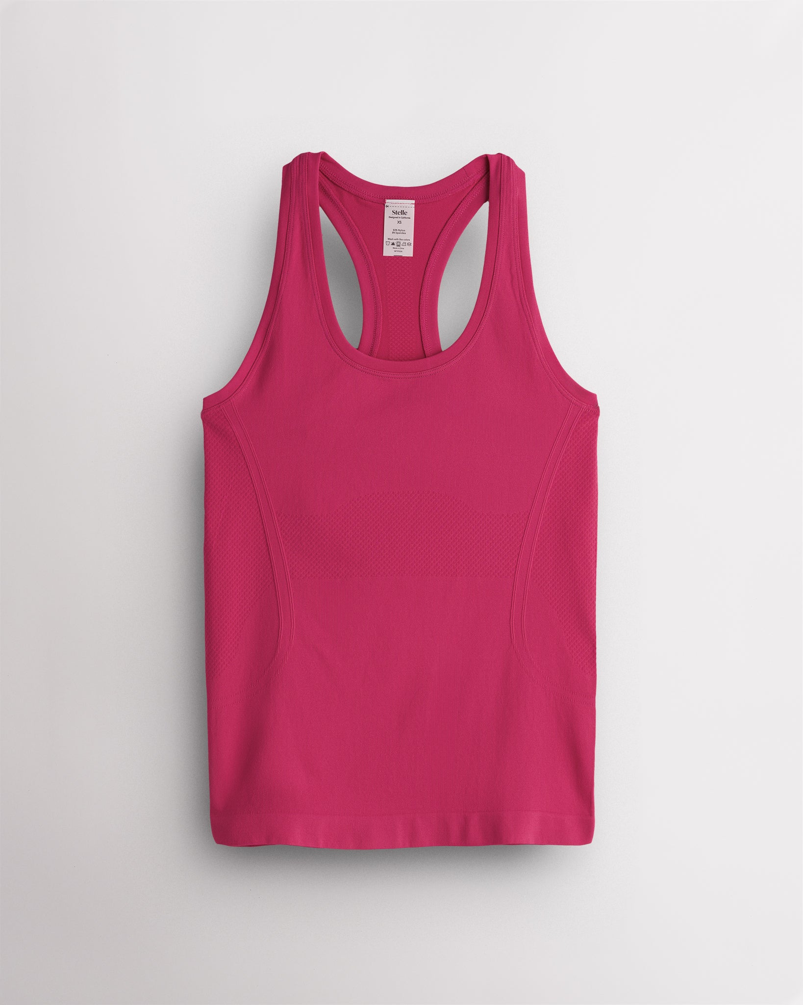 Dreamhouse Pink Stelle women's seamless racerback tank top in bright pink.