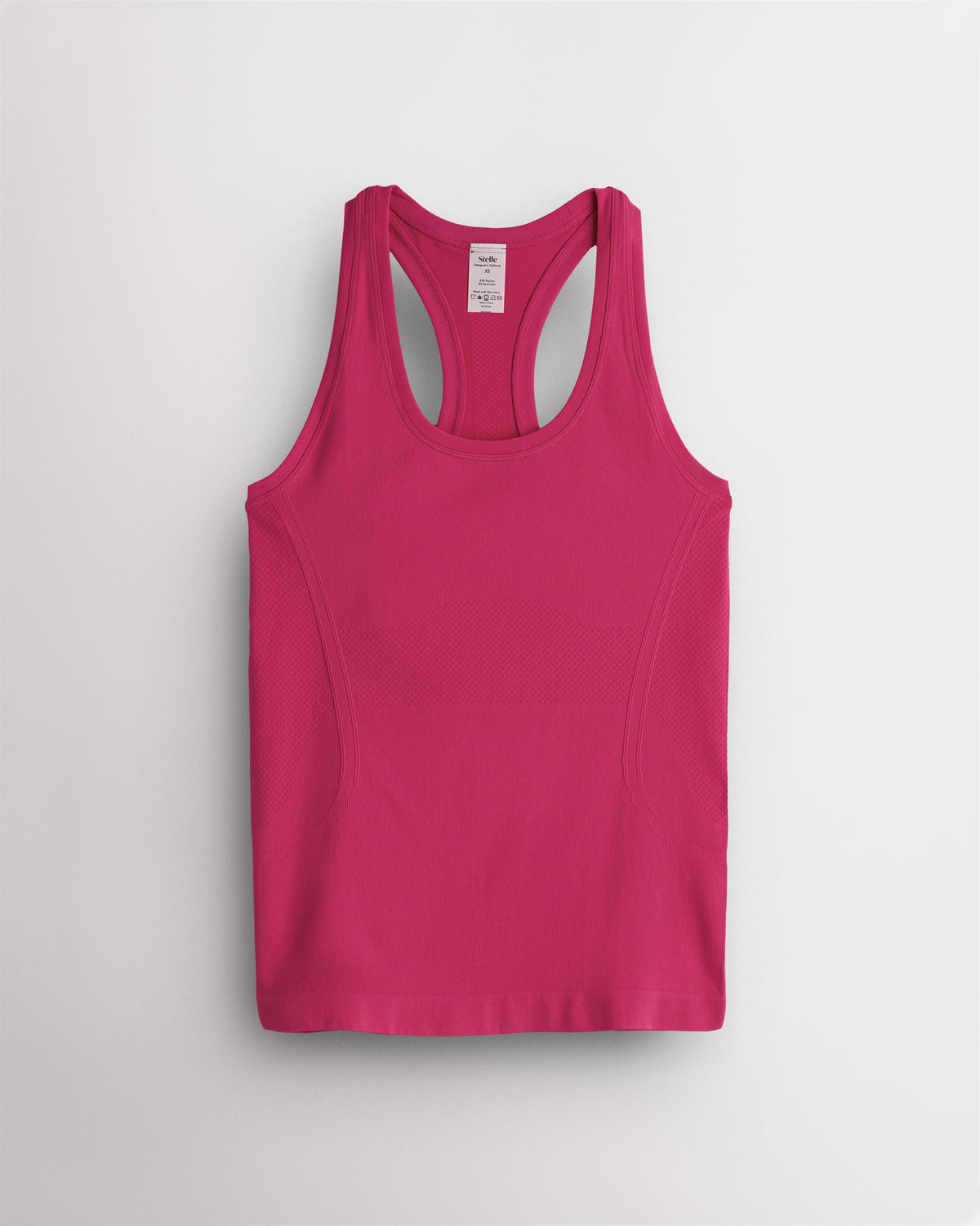 Dreamhouse Pink Stelle women's seamless racerback tank top in bright pink.
