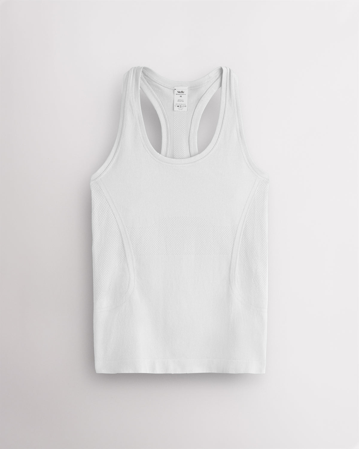 White Stelle women's seamless racerback tank top with a round neckline.