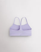 Back view of lavender girls sports bra showing minimal Y-shaped straps, smooth seams, and supportive band.