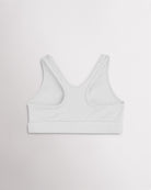 White racerback sports bra for girls with wide straps and a smooth band.