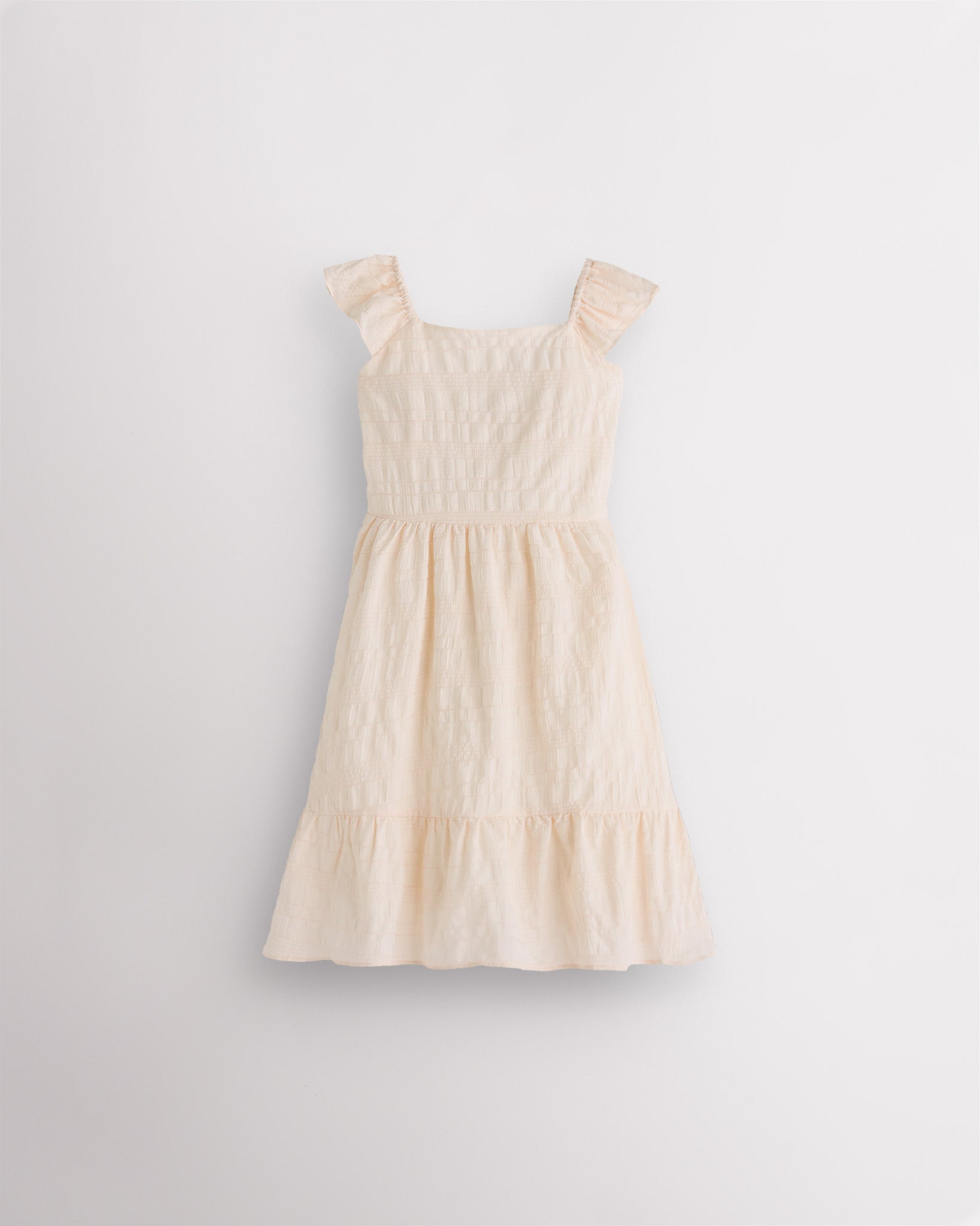 Girls butter flutter sleeve sundress with square neckline, smocked waist, and tiered hem, lightweight summer dress front view