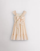 Girls butter flutter sleeve sundress with adjustable bow back, smocked waist, and tiered skirt, back view showing bow detail