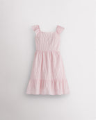Girls light pink flutter sleeve sundress with square neckline, smocked waist, and tiered hem, lightweight summer dress front view