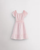 Light pink girls smocked summer dress with short sleeves, square neck, fit-and-flare shape, and ruffle hem.