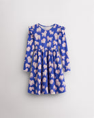 Charlie Pals on Blue girls long sleeve dress with ruffle shoulder details, gathered waist, A-line silhouette, and playful animal print.