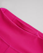 Close-up of hot pink girls yoga leggings showing smooth fabric and high-rise waistband with hidden pocket