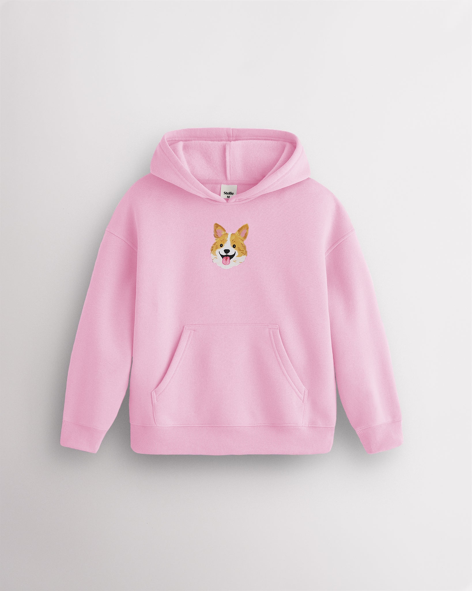 Glow Pink kids dog print hoodie laid flat with hood, front kangaroo pocket, ribbed cuffs and hem, and corgi graphic.