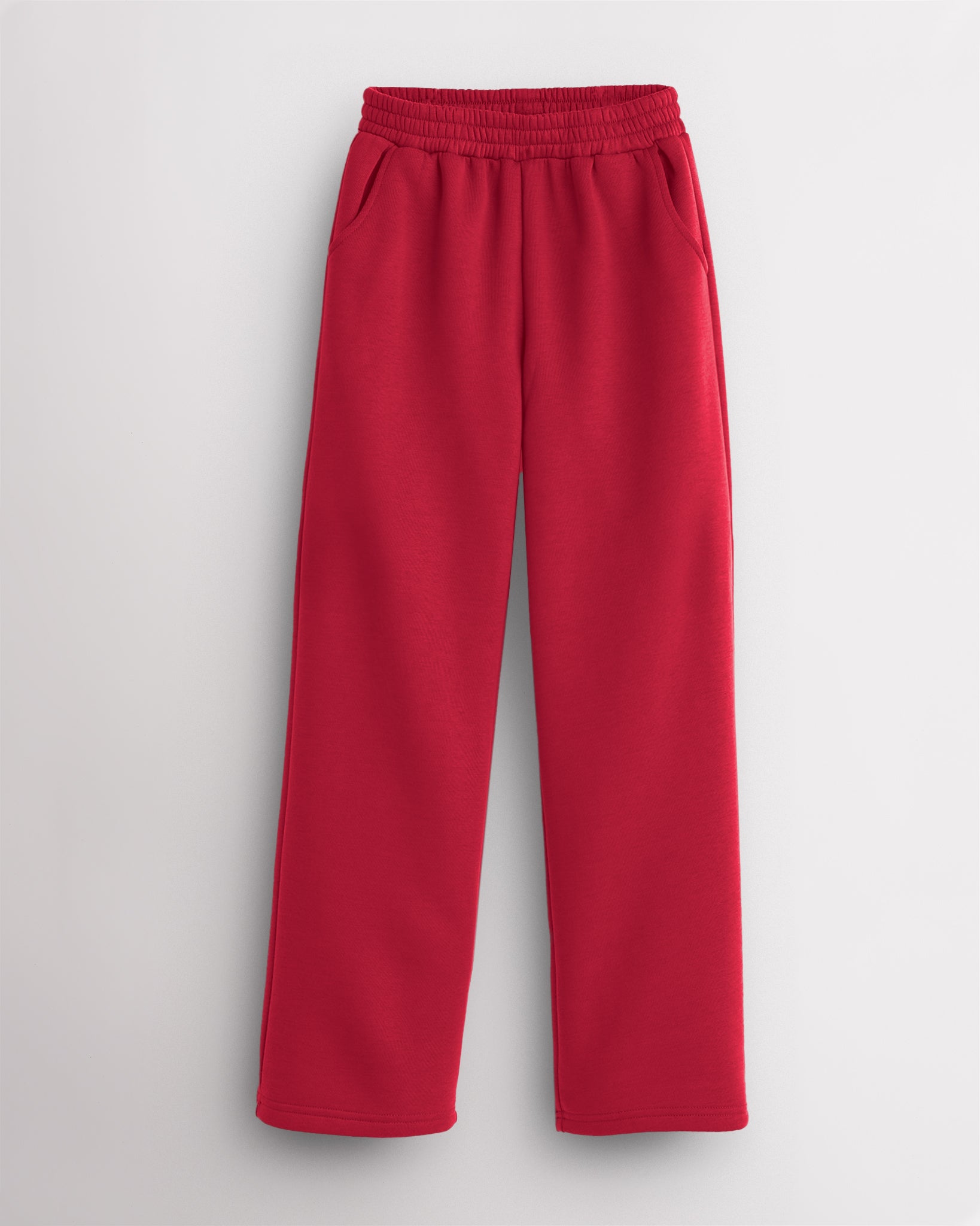 Red Stelle kids fleece sweatpants with an elastic waist and side pockets.