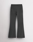 Charcoal girls flare leggings with a high-waisted fit, two deep side pockets, and extra flared legs for active and casual wear.