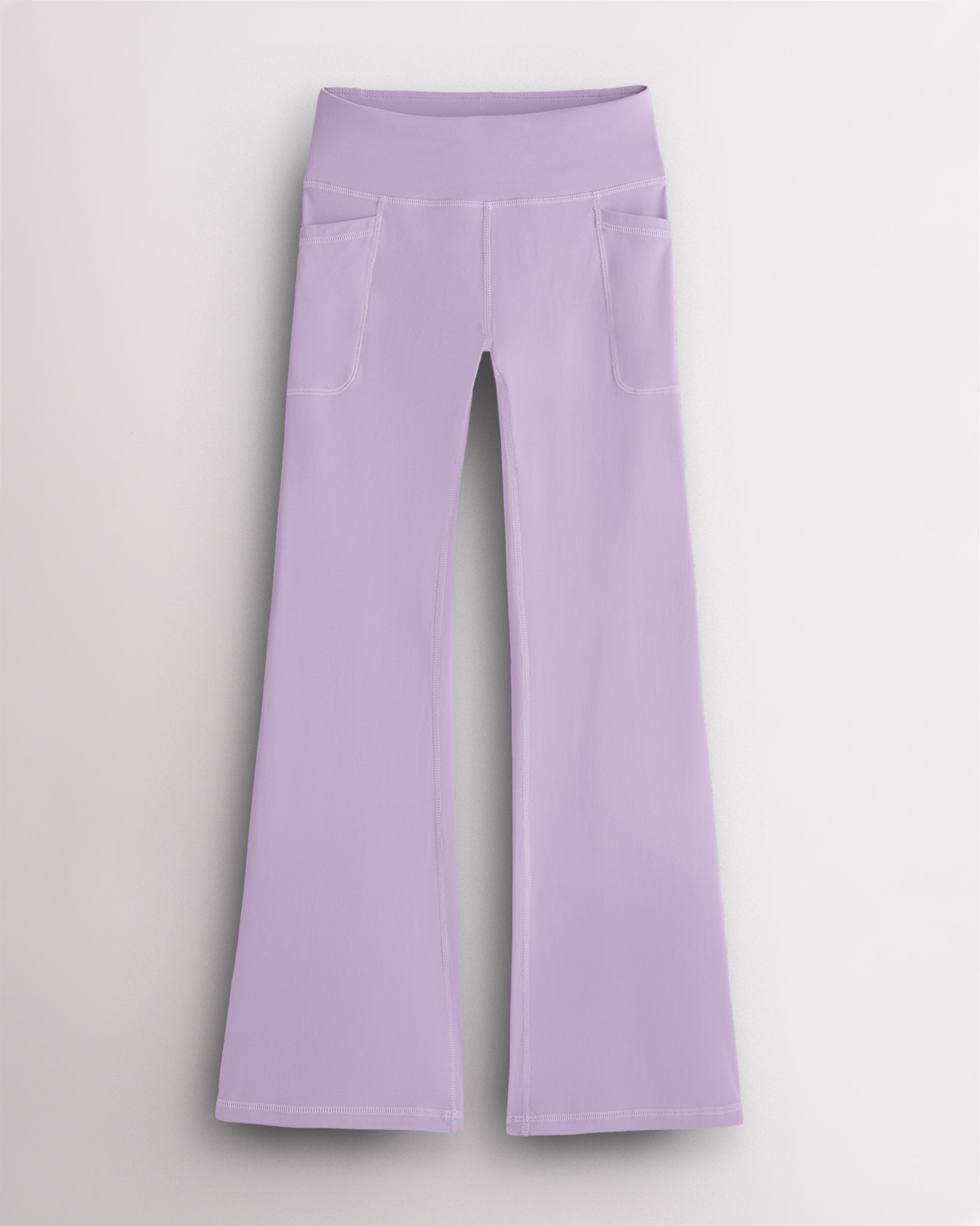 Light purple kids flare leggings with high-rise waistband and side pockets, soft stretch girls workout leggings