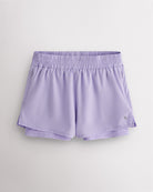 Lavender Stelle women’s 2-in-1 running shorts with elastic waistband, zipper pockets, inner shorts liner, and curved side hems.