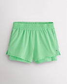 Neon Green Stelle women’s 2-in-1 running shorts with elastic waistband, zipper pockets, inner shorts liner, and curved side hems.