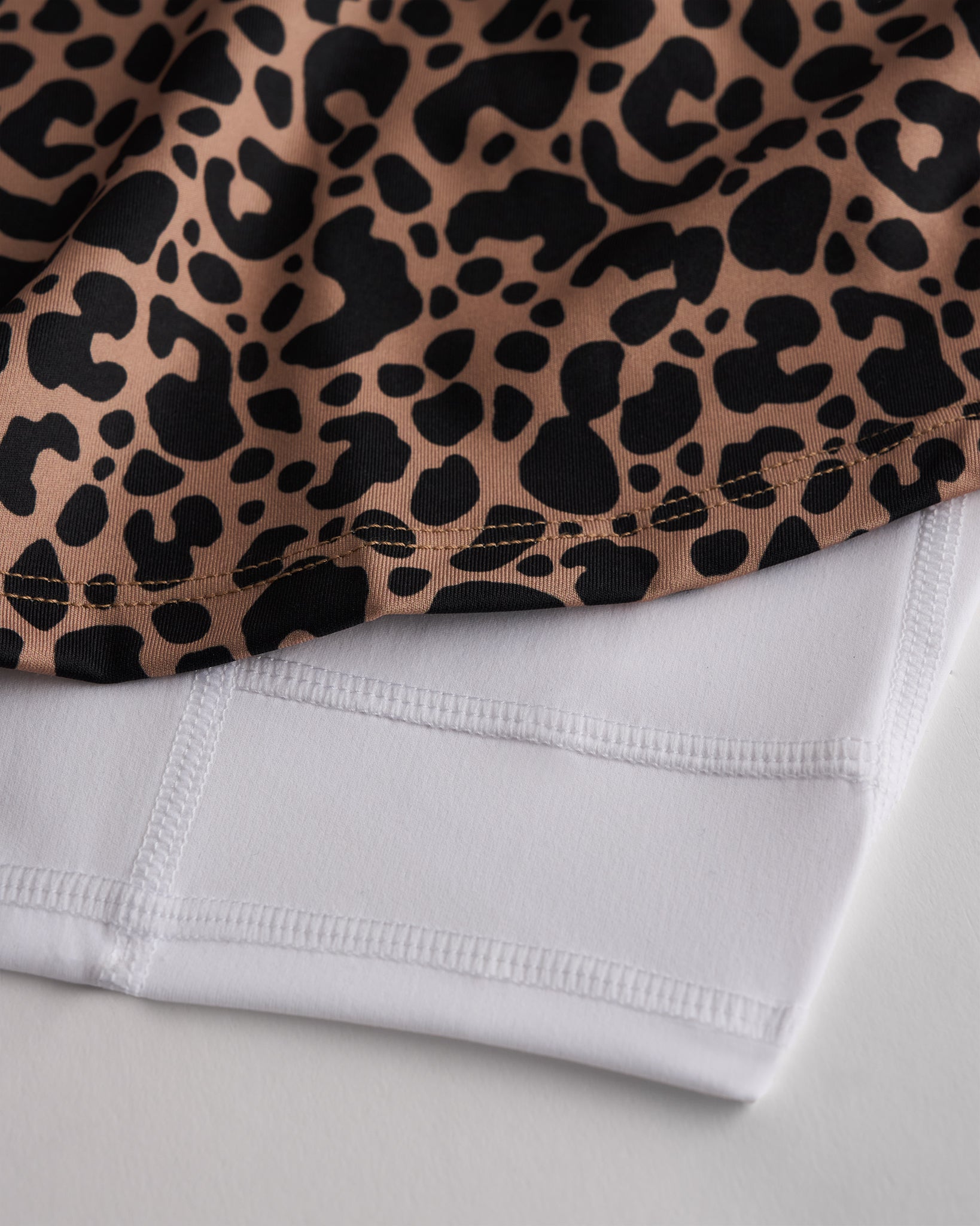 Close-up of tennis skirt fabric with built-in white shorts for coverage