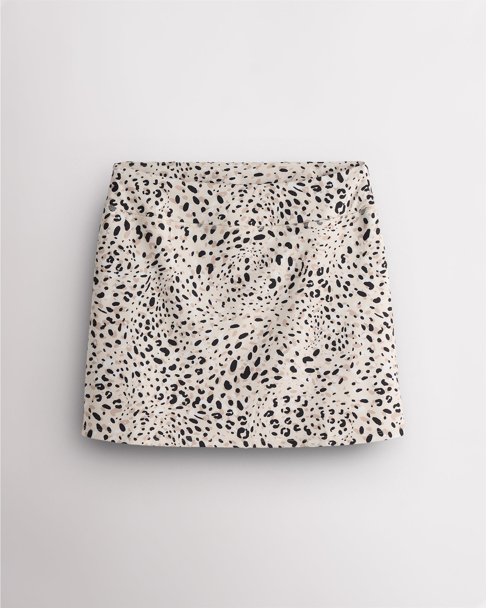 Women’s white cheetah print pleated tennis skirt with high-waist waistband