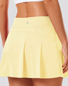 pleated tennis skirt Lemon Butter back view 