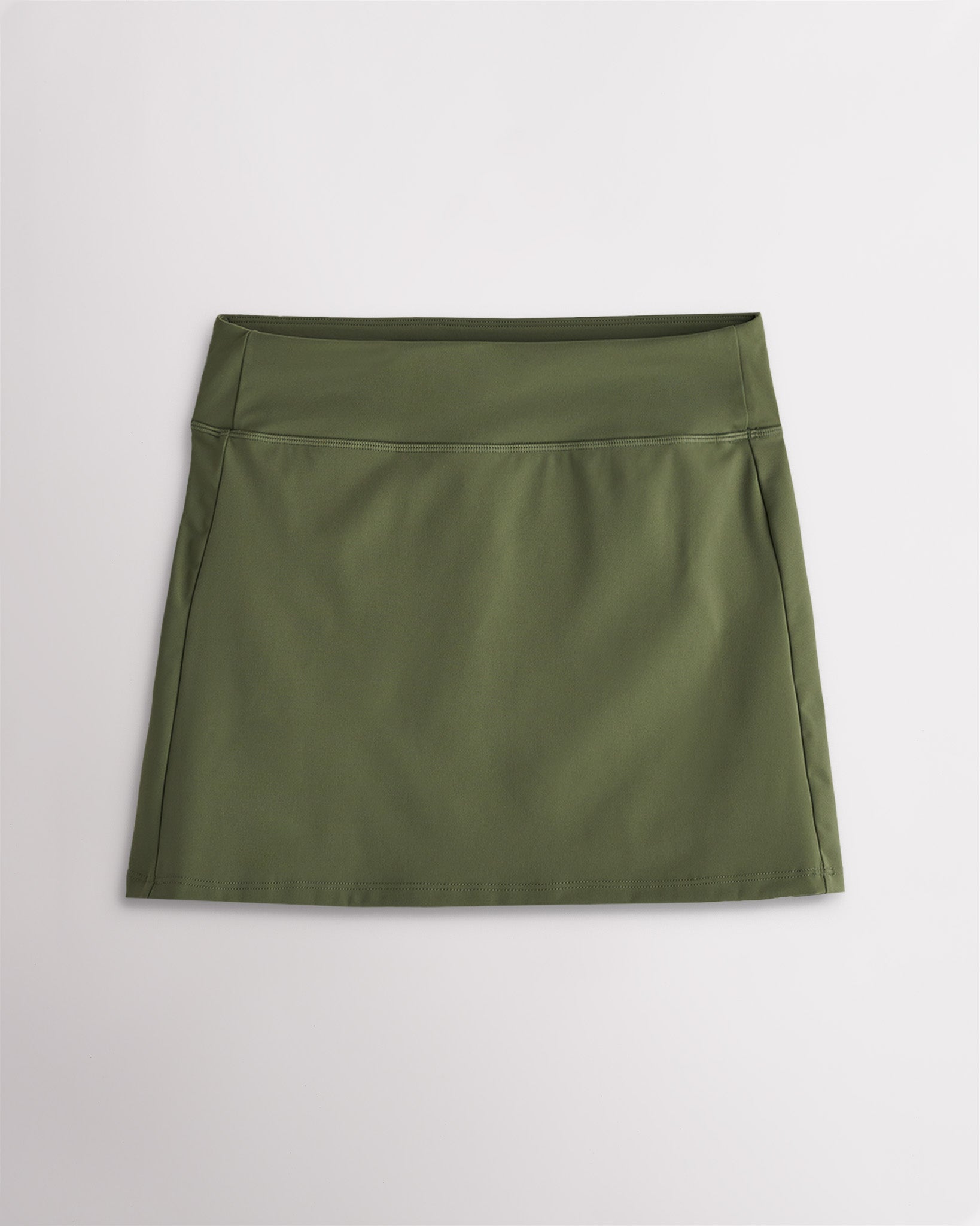 Army green A line tennis skirt with smooth waistband and athletic fit for tennis and active wear.