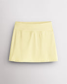 Lemon Butter Stelle Ruffle Ace tennis skirt with a high-waisted fit, lightly flared silhouette, and smooth stretch fabric.