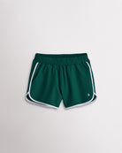 Girls evergreen athletic shorts with white trim, a stretchy elastic waistband, curved hems, and lightweight sporty design.