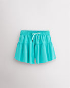 Aqua blue Kids Let’s Bounce Shorts with flowy design, elastic waistband, drawstring, lightweight fabric, and built-in lining for practice and play.