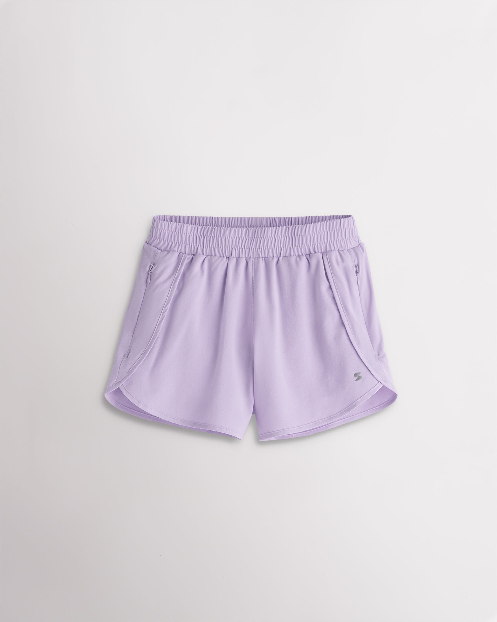 Lavender girls athletic running shorts with a high-rise fit, wide elastic waistband, 3-inch inseam, and curved hems.