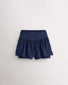 Navy girls 2-in-1 high waisted shorts with flowy outer layer and built-in liner for comfort and active movement