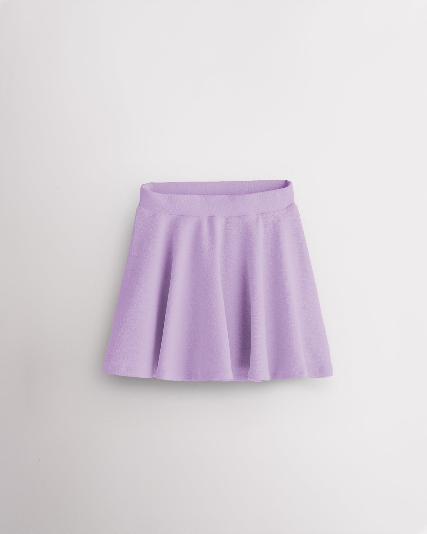 Lilac girls casual skater skort with a high-waisted fit, elastic waistband, flared skirt silhouette, and built-in shorts.