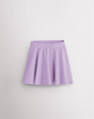 Lilac girls casual skater skort with a high-waisted fit, elastic waistband, flared skirt silhouette, and built-in shorts.