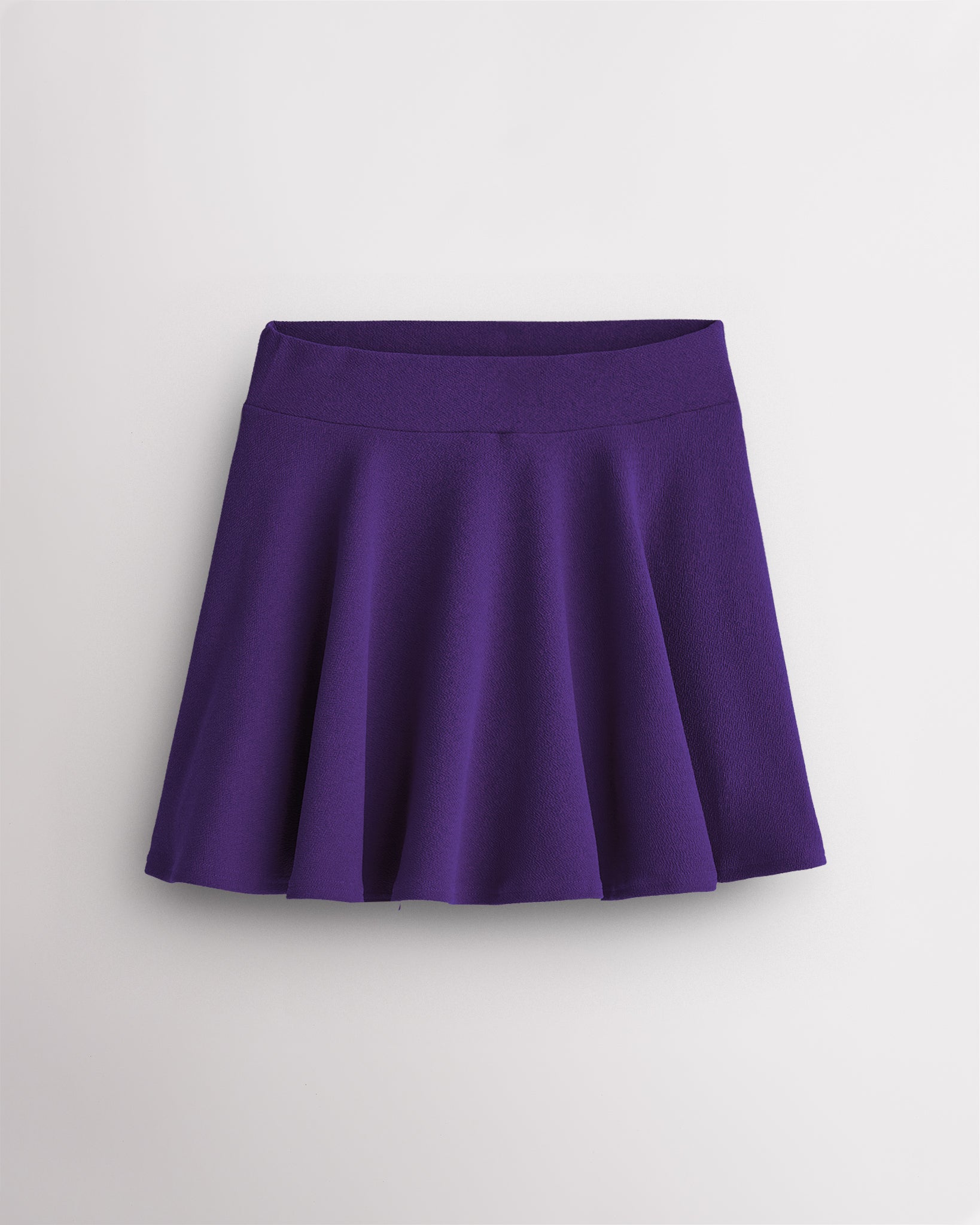 Purple girls casual skater skort with a flared A-line silhouette, elastic waistband, and built-in shorts design.