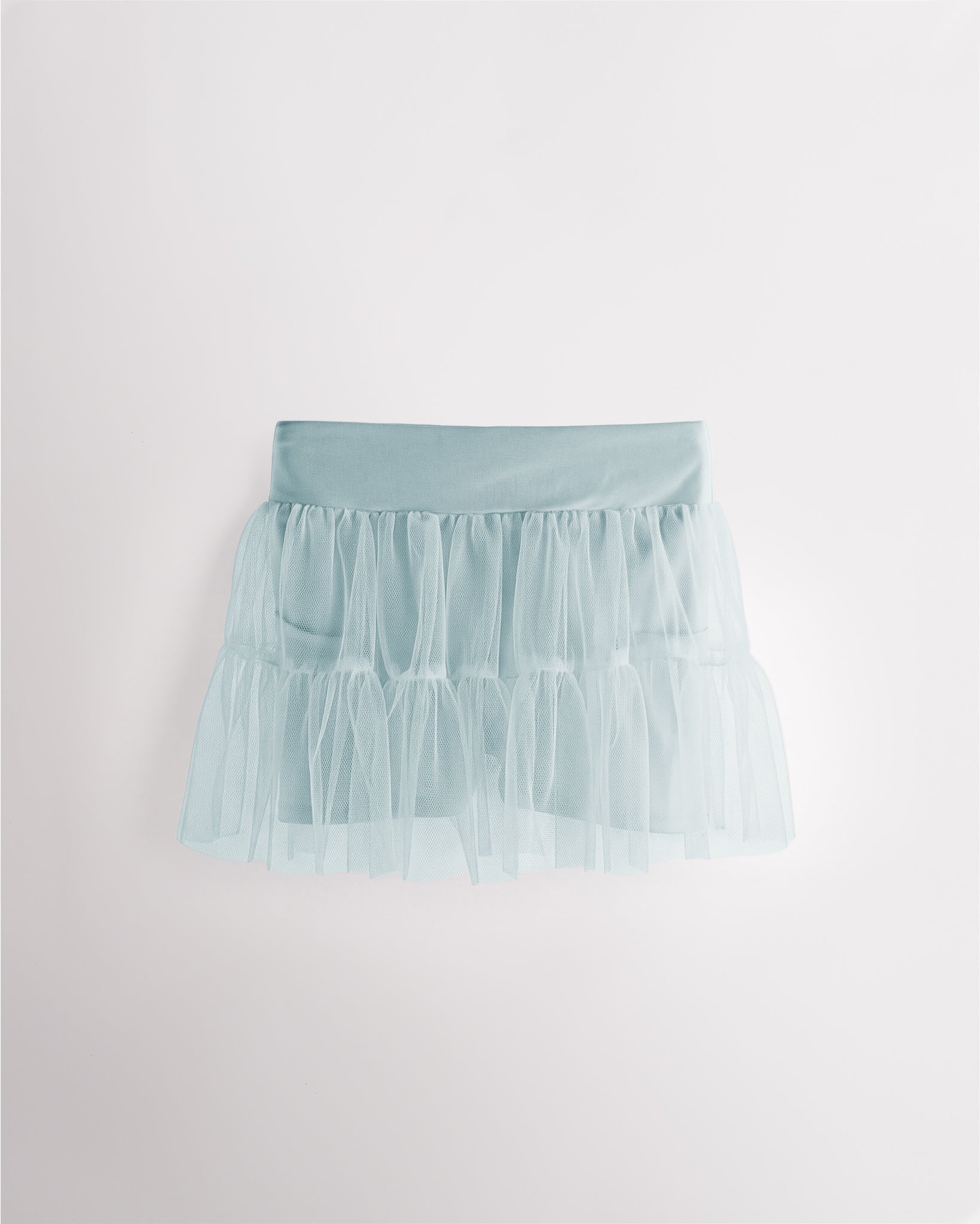 Light Blue girls layered skort with a high-waisted fit, tiered mesh skirt, and built-in shimmer shorts.
