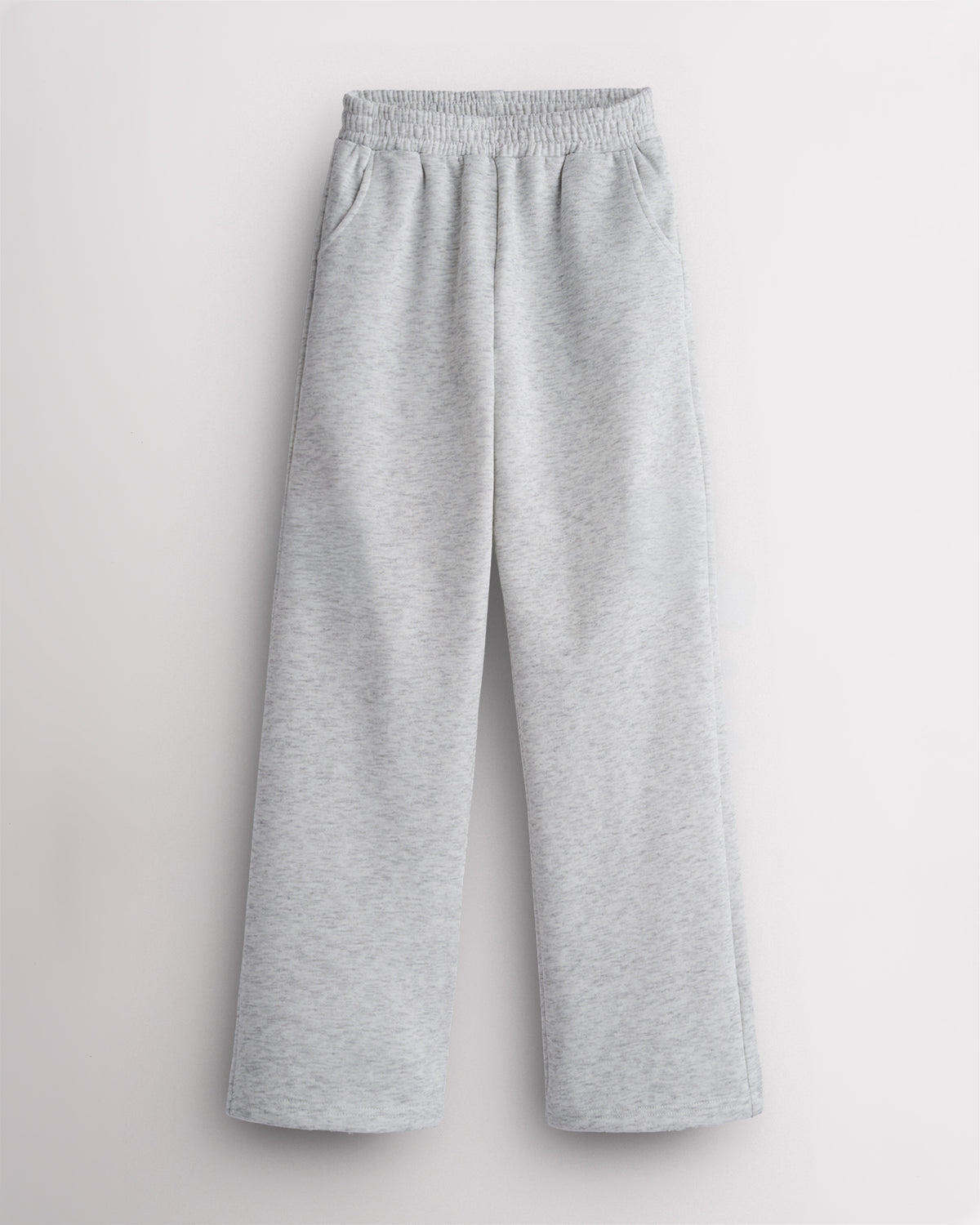 Stelle Fleece Out Kids Sweatpants in Light Heather Grey, flat lay showing elastic waistband, side pockets and relaxed wide-leg fit