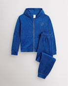 Sapphire Stelle kids velour tracksuit set with full-zip hoodie and matching joggers, laid flat on a grey background.