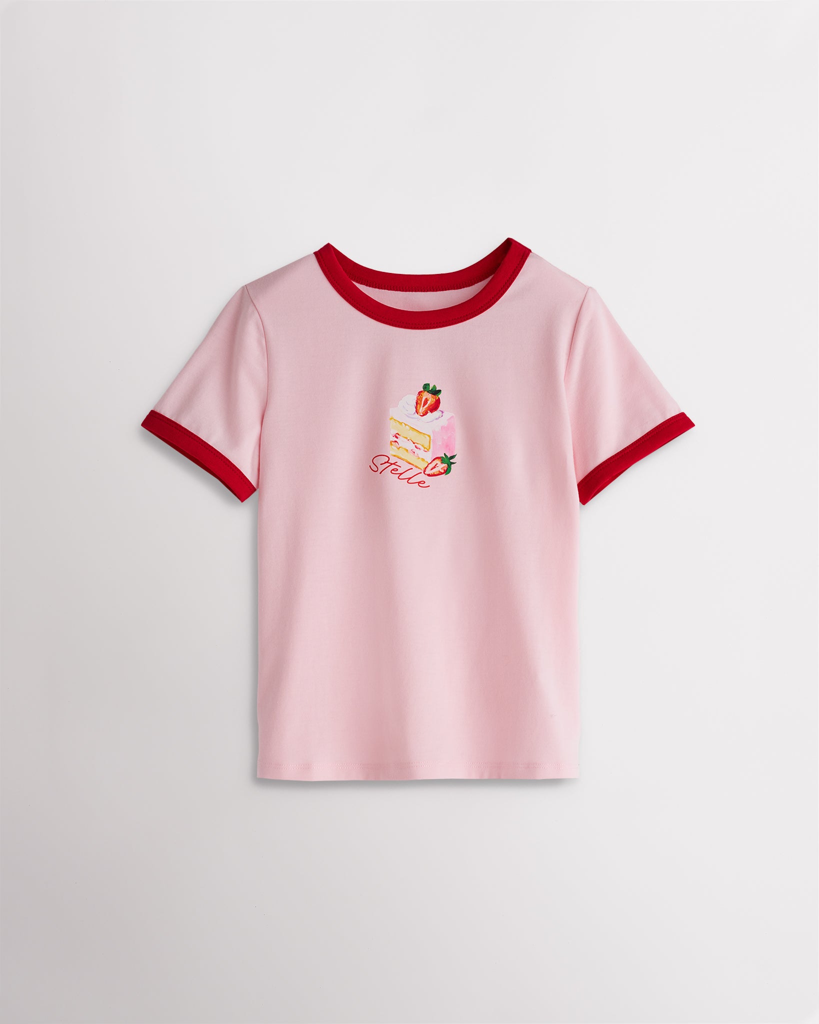Kids pink retro ringer graphic tee with red trim and strawberry cake print, short sleeve casual kids t-shirt.