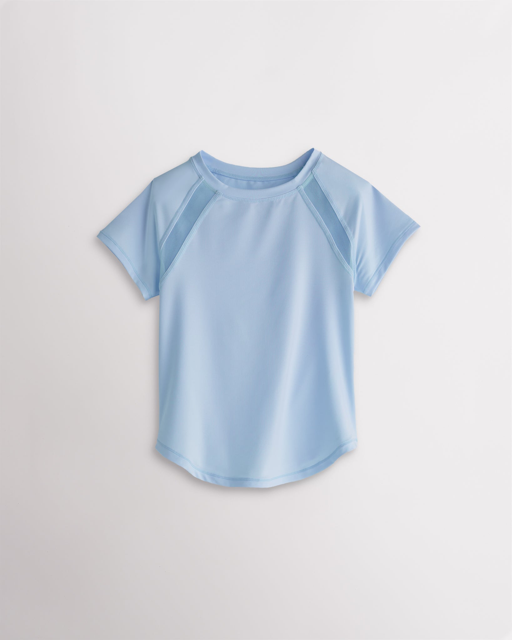 Kids light blue athletic t-shirt with mesh paneling and raglan sleeves, short sleeve breathable kids sports tee.