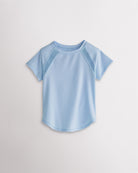 Kids light blue athletic t-shirt with mesh paneling and raglan sleeves, short sleeve breathable kids sports tee.