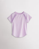 Kids light purple athletic t-shirt with mesh paneling and raglan sleeves, short sleeve breathable kids sports tee.