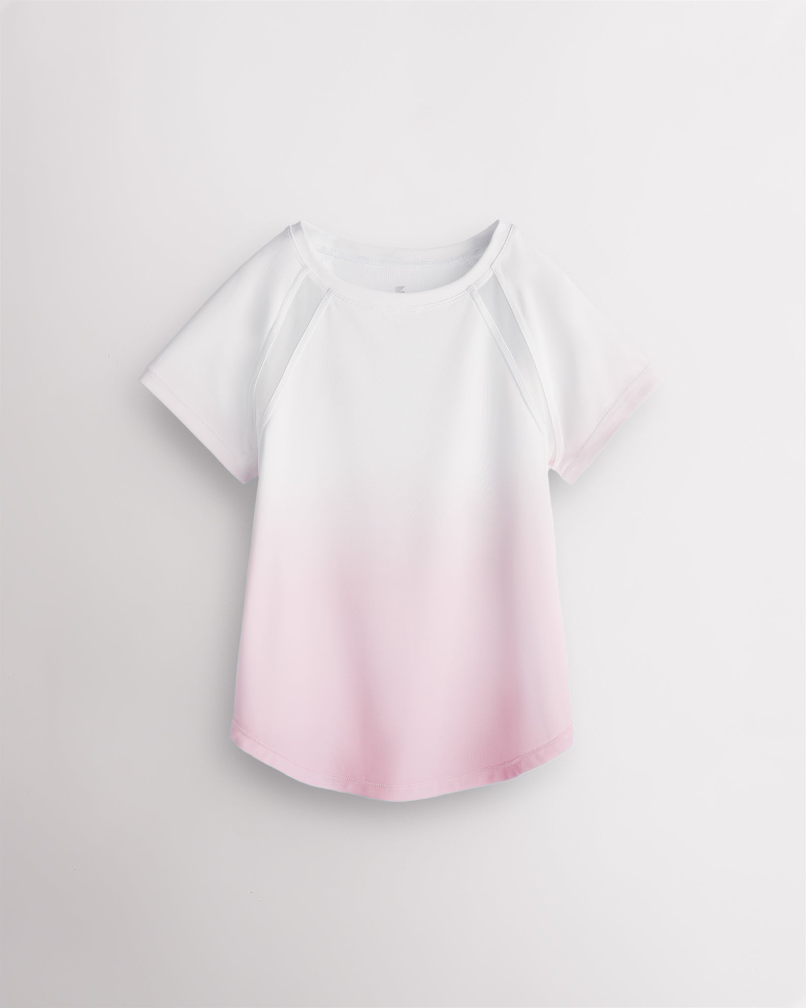 Stelle kids ombre athletic t-shirt with mesh paneling, raglan sleeves, and curved hem on white background
