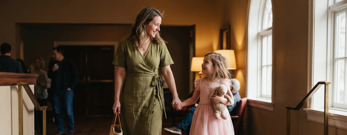 Mother and daughter dressed smart casual deciding what to wear to the ballet