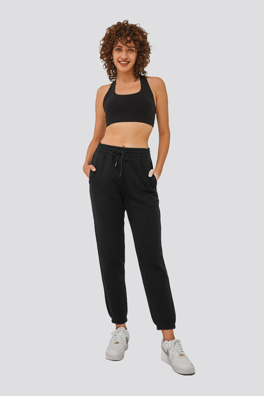 cotton joggers women black front view