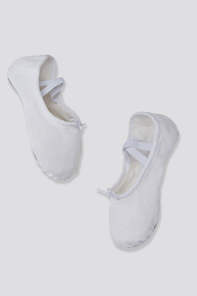 girls white ballet shoes side view
