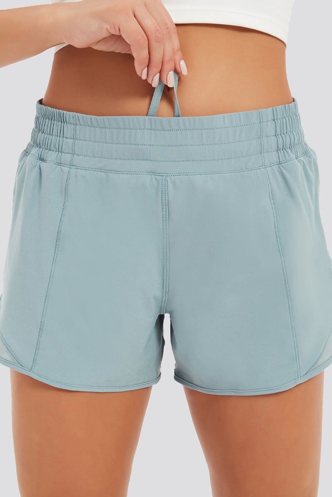 running shorts with pockets blue front view
